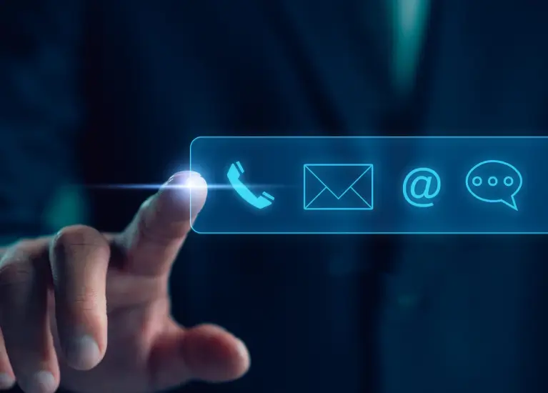 a finger touching a blue screen with icons