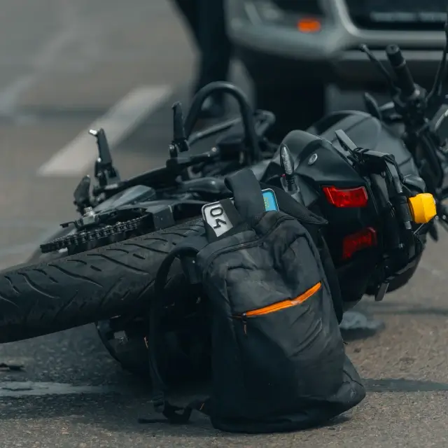 a motorcycle lying on the ground
