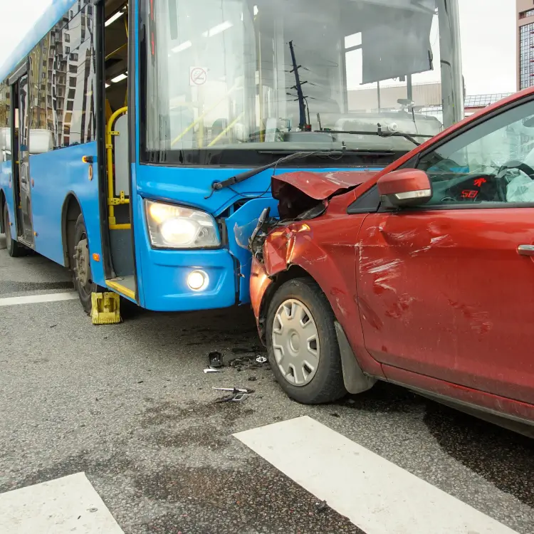 a car that has crashed into a bus