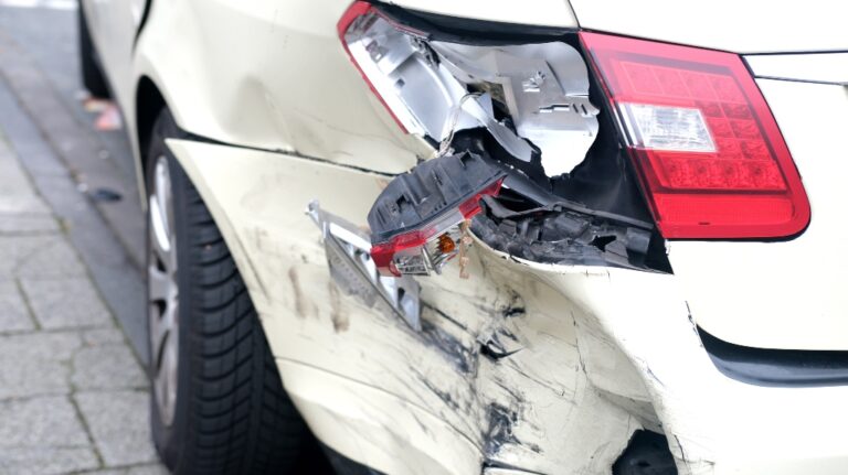 heavily damaged car after a car accident