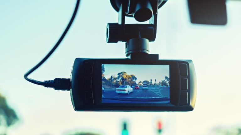 Dashboard camera in action installed on car windscreen