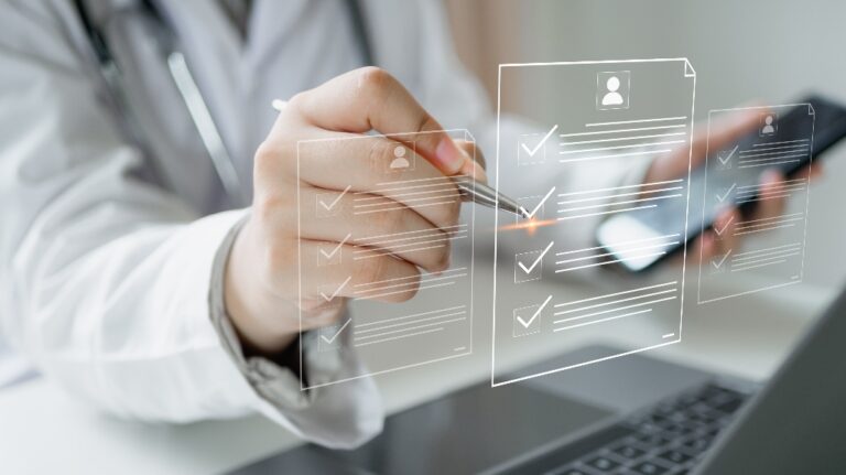 Medicine doctor use laptop to review patient medical records