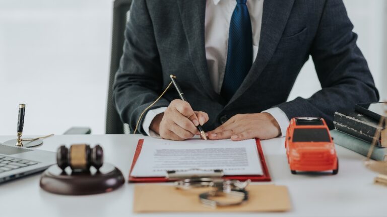 Judge male hand with car and documents