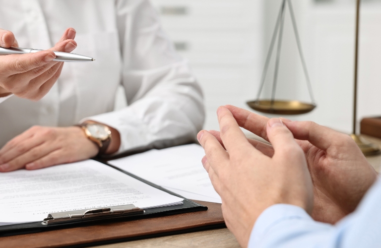 man is meeting lawyer for consultation